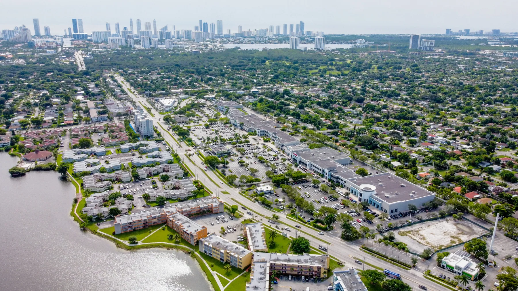 Aerial view of a grocery-anchored retail center trade area