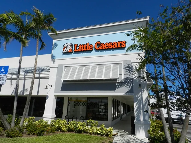 Planet Fitness Plaza storefront on S Powerline Road, Pompano Beach